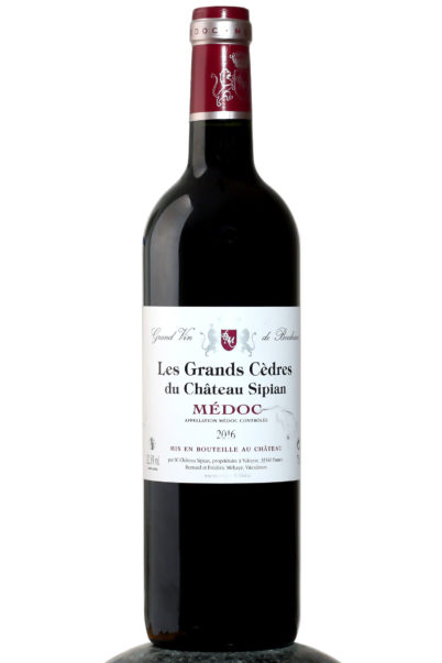 a bottle of Le Grands Cedres du Chateau Sipian Medoc 2016 wine
